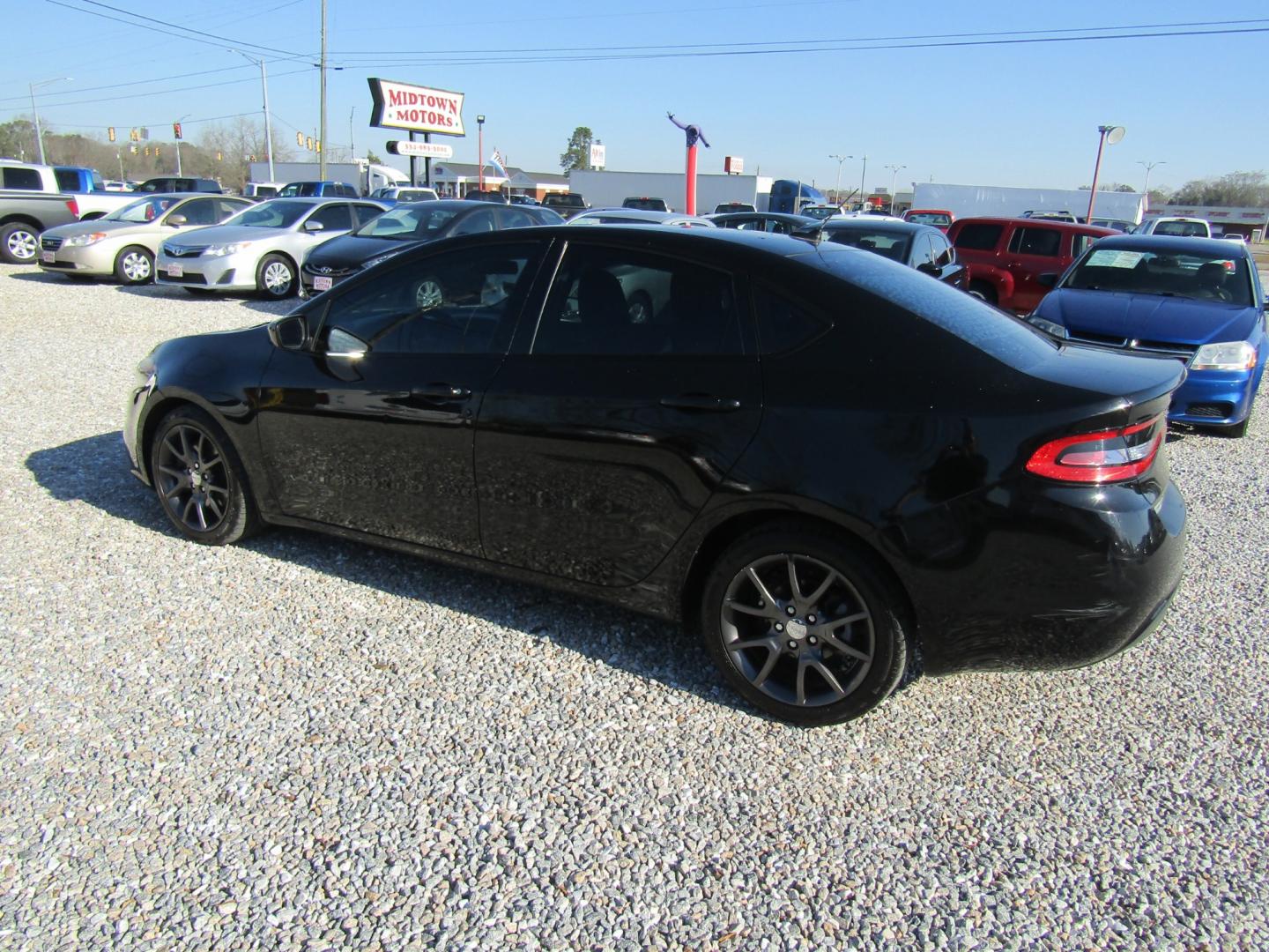 2015 Black /Black Dodge Dart SE (1C3CDFAA9FD) with an 2.0L L4 DOHC 16V TURBO engine, Automatic transmission, located at 15016 S Hwy 231, Midland City, AL, 36350, (334) 983-3001, 31.306210, -85.495277 - Photo#5